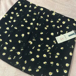 NWT flowered mini skirt. Jean like material. Size 7/23W